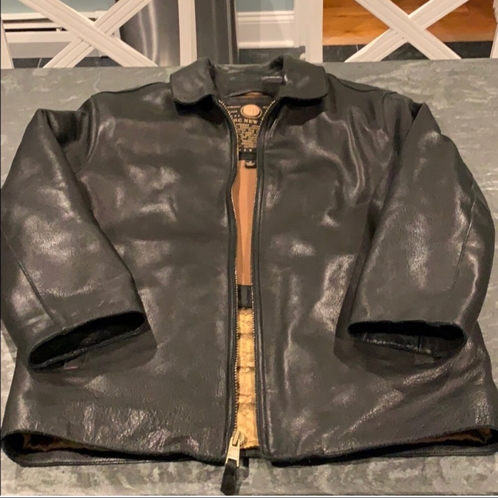 Andrew Marc classic leather waist jacket.